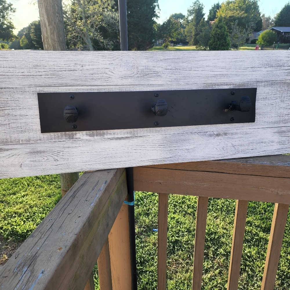 Farmhouse handmade rail spike coat rack.